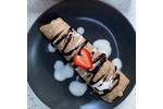 Crepes with strawberries & chocolate Sauce.png